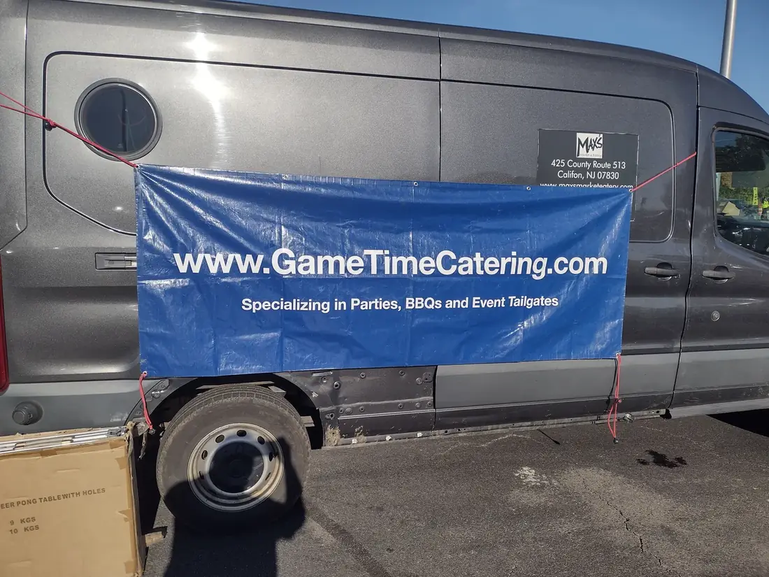 The Gametime Catering branded truck at an event